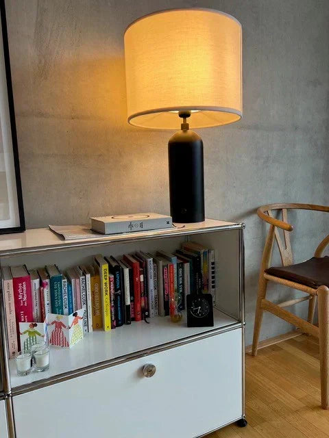 I am awakened by an analog alarm clock.