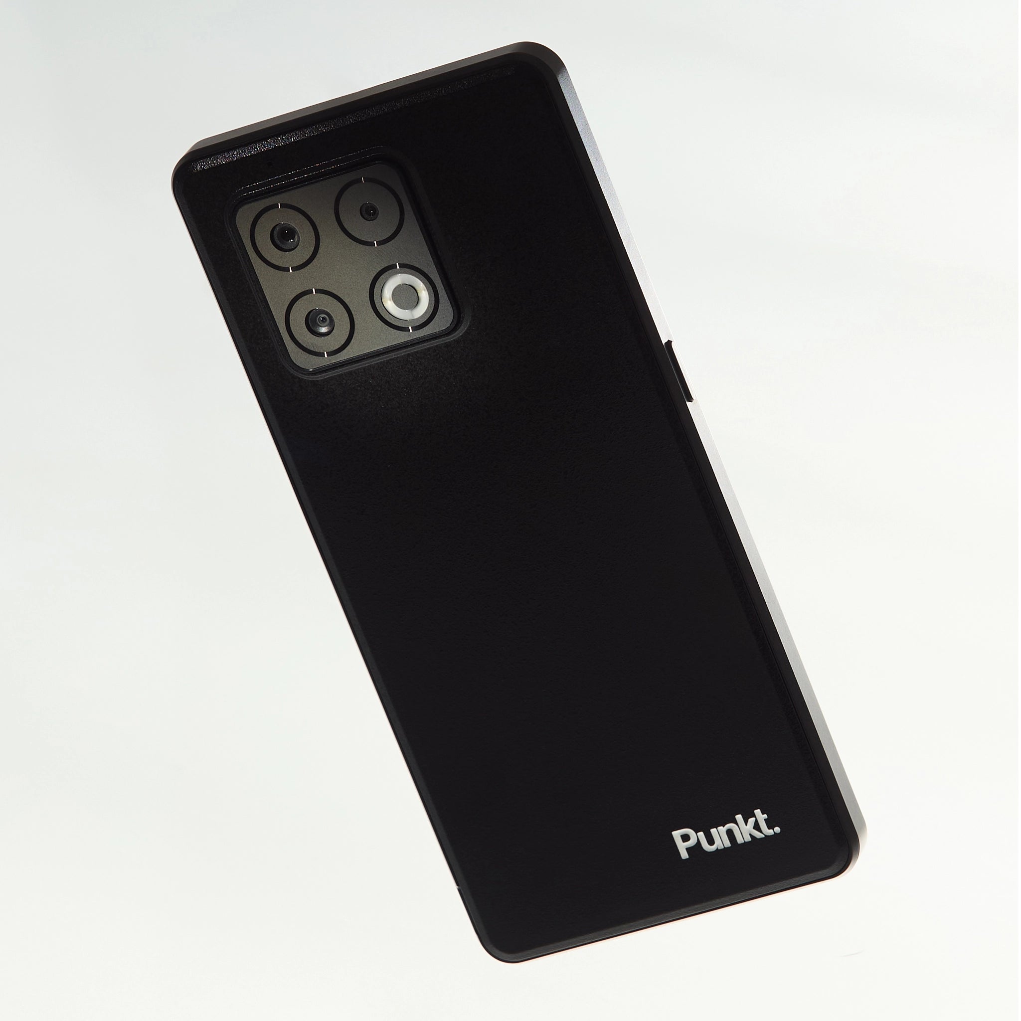 Black smartphone with 'Punkt' branding on a white background