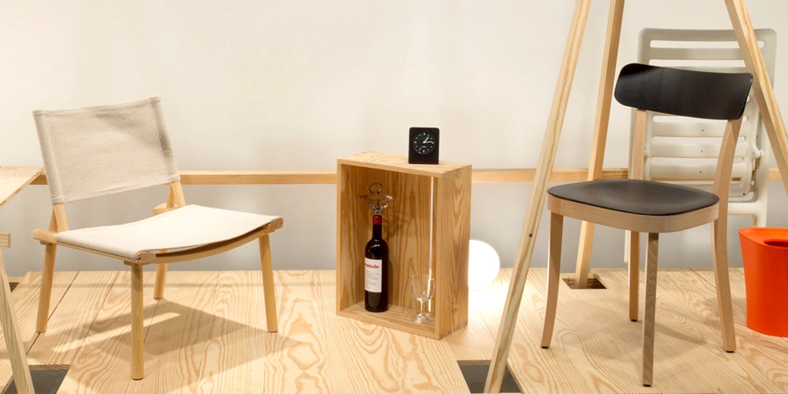 The Punkt AC01 analogue alarm clock displayed on a plinth within Tate Modern gallery