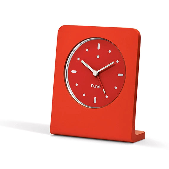Side view of Punkt AC01 clock – White frame with red front, view from side showing the clock depth and profile.