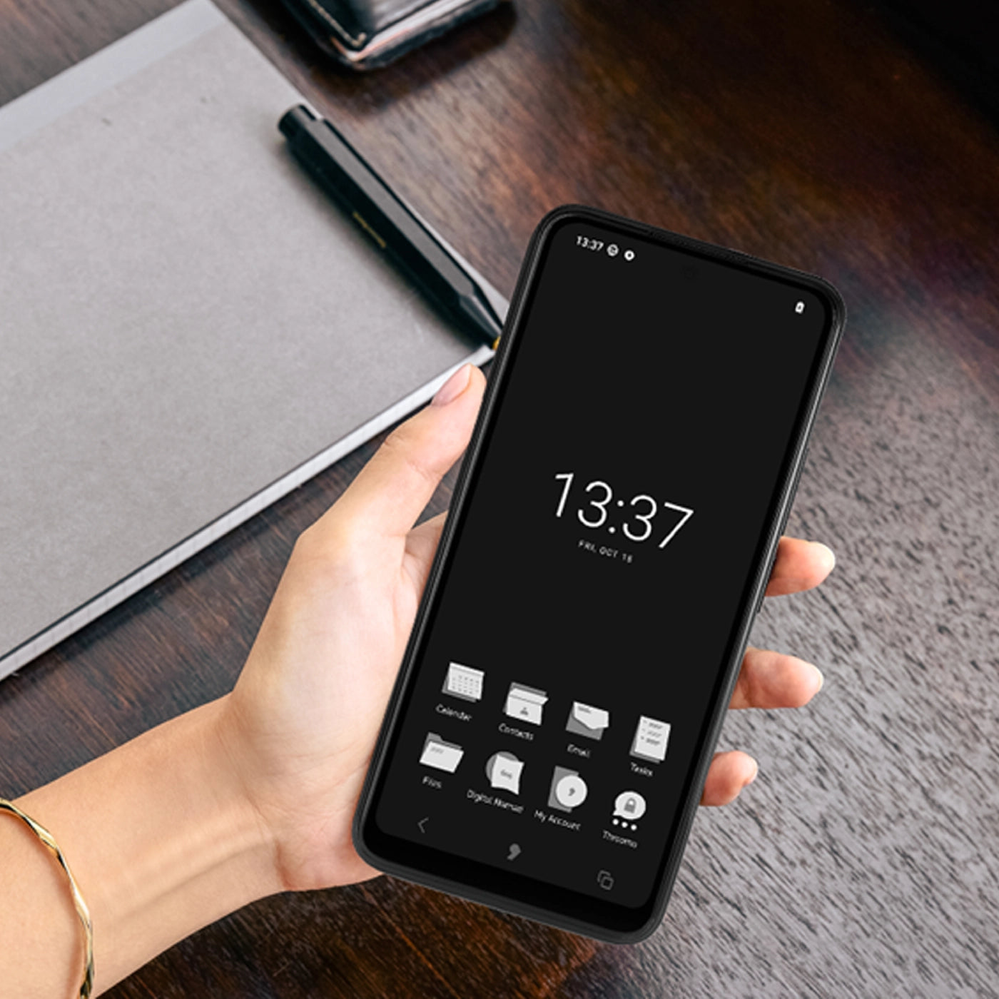 Lifestyle image of the Punkt MP02 on a textured surface, emphasising its understated design and finish.