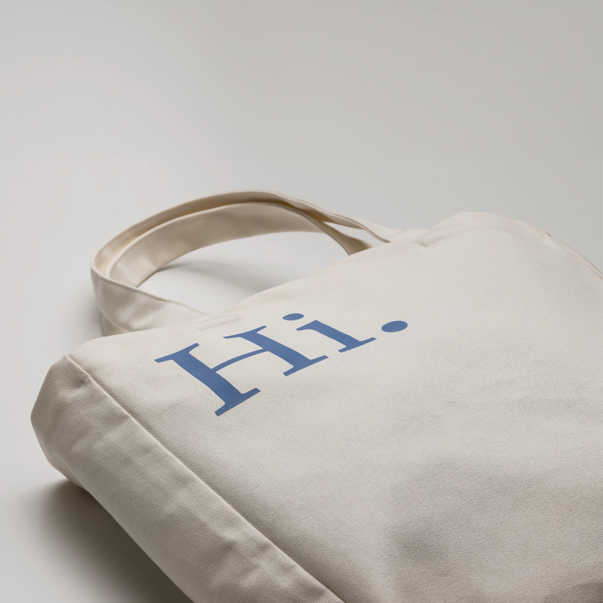 tote bag beige front with-message white background