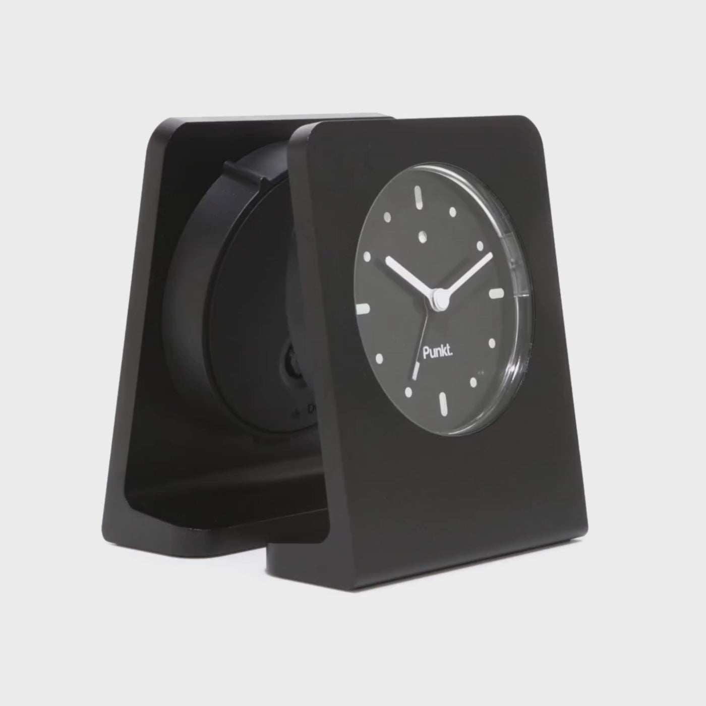 Side-by-side video showcasing the Punkt AC02 alarm clocks with black and blue second hands, highlighting their subtle design differences.
