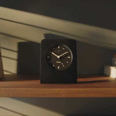 A sleek minimalist home featuring elegant Punkt. tech devices blending seamlessly with modern décor.