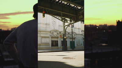 Video thumbnail showing a light blue Punkt MP02 mobile phone on a warm beige background with the text ‘The Punkt. MP 02 – The video opens with a sequence of various images before revealing the phone itself.